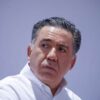 Su ausencia en la Comisión Permanente del Senado ha generado críticas de empresarios y opositores, quienes cuestionan la falta de transparencia del legislador.